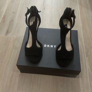 T-strap DKNY black suede pump. Worn one time. Box included.